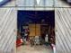 The barn's interior features a rustic skull and ample storage for tools and equipment at 8365 Aaron Creek Church Rd, Oxford, NC 27565