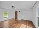 Bedroom features light colored walls and floors, and natural light from the window at 8365 Aaron Creek Church Rd, Oxford, NC 27565