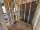 Unfinished bathroom with visible framing and plumbing, ready for customization at 90 Brookhaven Dr, Spring Hope, NC 27882