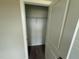 Walk-in closet with a single rack for storage, featuring a white door at 90 Brookhaven Dr, Spring Hope, NC 27882