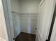 Walk-in closet with wire shelving and carpet flooring at 90 Brookhaven Dr, Spring Hope, NC 27882