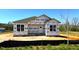 New construction home featuring a classic design and a spacious, undeveloped yard at 90 Brookhaven Dr, Spring Hope, NC 27882