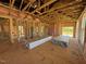 Open floor plan showcasing unfinished construction, offering a blank canvas for customization at 90 Brookhaven Dr, Spring Hope, NC 27882