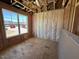 Bright interior with insulation and framing, ready for customization and design at 90 Brookhaven Dr, Spring Hope, NC 27882
