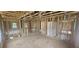 Upstairs unfinished area with stud walls, rough-ins for bath and shower at 91 Caspian Ct, Lillington, NC 27546