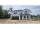 New construction two-story home featuring Tyvek HomeWrap and architectural details at 91 Caspian Ct, Lillington, NC 27546