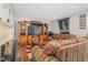 Inviting living room with patterned sofas, wooden accents, and a cozy fireplace at 940 Hill St, Rocky Mount, NC 27801