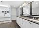 Elegant bathroom featuring a double vanity, modern fixtures, and a large walk-in shower at 9509 Greenfield Dr, Raleigh, NC 27615