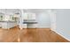 Large bonus room area features hardwood floors, custom built-ins and natural light at 9509 Greenfield Dr, Raleigh, NC 27615