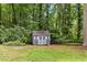 Exterior shot of the backyard shed at 9509 Greenfield Dr, Raleigh, NC 27615
