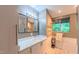 Modern bathroom featuring subway tile, a large mirror, and a window for natural light at 1 Davie Ln, Chapel Hill, NC 27514