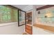 Built-in wine refrigerator next to white cabinets at 1 Davie Ln, Chapel Hill, NC 27514