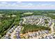Picturesque aerial shot of neighborhood with tree-lined streets and single-Gathering houses at 1004 Bridlemine Dr, Fuquay Varina, NC 27526