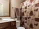 Bathroom featuring a vanity, toilet, and a shower with a decorative curtain at 1004 Bridlemine Dr, Fuquay Varina, NC 27526
