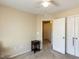 Bright bedroom featuring a ceiling fan, closet, and neutral carpet at 1004 Bridlemine Dr, Fuquay Varina, NC 27526