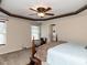 Bedroom features a ceiling fan and decorative ceiling trim at 1004 Bridlemine Dr, Fuquay Varina, NC 27526