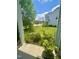Well-maintained front yard with lush landscaping, mature trees, and inviting curb appeal at 1004 Bridlemine Dr, Fuquay Varina, NC 27526