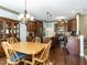 Open-concept kitchen with stainless steel appliances, granite countertops, and an island at 1004 Bridlemine Dr, Fuquay Varina, NC 27526