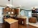 Well-appointed kitchen with granite countertops, stainless appliances, and easy access to living spaces at 1004 Bridlemine Dr, Fuquay Varina, NC 27526