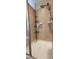 Shower boasting a glass door and shower caddy at 1004 Bridlemine Dr, Fuquay Varina, NC 27526