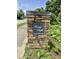 Stone entrance sign reading 