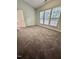 Bedroom with neutral paint, lots of light and carpet at 1017 Red Hat Ln, Durham, NC 27713