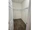 Functional walk-in closet with carpeted floor and wire shelving at 1017 Red Hat Ln, Durham, NC 27713