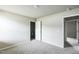 Comfortable bedroom featuring neutral walls, ceiling fan, and a closet at 103 Hampshire Pl, Kenly, NC 27542