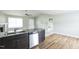 Contemporary kitchen with stainless steel dishwasher, double sink, and granite countertops at 103 Hampshire Pl, Kenly, NC 27542