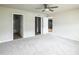 Spacious main bedroom with multiple doors providing access to bathroom, closet, and other living areas at 103 Hampshire Pl, Kenly, NC 27542