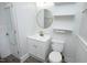 Modern bathroom with white vanity, round mirror, and stylish fixtures at 106 E Club Blvd, Durham, NC 27704