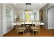 Bright dining room featuring a modern chandelier and natural light, great for Gathering dinners at 106 E Club Blvd, Durham, NC 27704