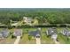 Wide aerial shot showcasing a neighborhood with trees, houses, and the home's location at 106 Lockwood Dr, Cameron, NC 28326