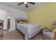 Comfortable bedroom features a ceiling fan and natural light at 106 Lockwood Dr, Cameron, NC 28326