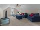 This bonus room offers a comfy seating area and cozy sleeping nook in a relaxing, neutrally-toned space at 106 Lockwood Dr, Cameron, NC 28326
