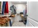 Well-organized walk-in closet featuring ample shelving and hanging space for clothes and accessories at 106 Lockwood Dr, Cameron, NC 28326