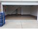 Spacious garage featuring a sealed epoxy floor with a utility sink, and ample storage space at 106 Lockwood Dr, Cameron, NC 28326