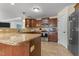 Open kitchen features modern appliances, granite countertops, and access to the living area at 106 Lockwood Dr, Cameron, NC 28326