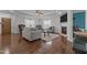 Spacious living area with a fireplace, hardwood floors, and comfortable seating at 106 Lockwood Dr, Cameron, NC 28326