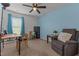 Office space with lots of natural light, comfortable seating, and a ceiling fan at 106 Lockwood Dr, Cameron, NC 28326