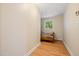 Bright bedroom with beadboard ceiling, wood floors, and natural light at 1085 Bynum Rd, Pittsboro, NC 27312