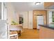 Inviting kitchen with a small breakfast table and white refrigerator at 1085 Bynum Rd, Pittsboro, NC 27312