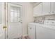 Functional laundry room with included washer and dryer at 109 Ruby Walk Dr, Morrisville, NC 27560