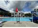 Community pool with lifeguard stand and slide, perfect for summer fun and relaxation at 109 Ruby Walk Dr, Morrisville, NC 27560