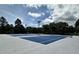 Well-maintained blue tennis courts offer a great space for exercise and friendly competition at 109 Ruby Walk Dr, Morrisville, NC 27560