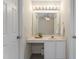 Bright bathroom sink area, featuring a vanity with a large mirror and great lighting at 118 Setter Pt, Clayton, NC 27520