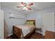 Cozy bedroom with hardwood floors, natural light and built in shelving at 1205 Elysian Way, Rougemont, NC 27572