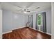 Bedroom featuring hardwood floors, large windows with peaceful views, and ample natural light at 1205 Elysian Way, Rougemont, NC 27572
