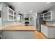 Bright kitchen featuring white cabinets, stainless steel appliances, and lots of counter space at 1205 Elysian Way, Rougemont, NC 27572