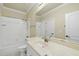 Well-lit bathroom featuring a bathtub and shower combination with a single sink and modern finishes at 1210 Brooks Ave, Raleigh, NC 27607